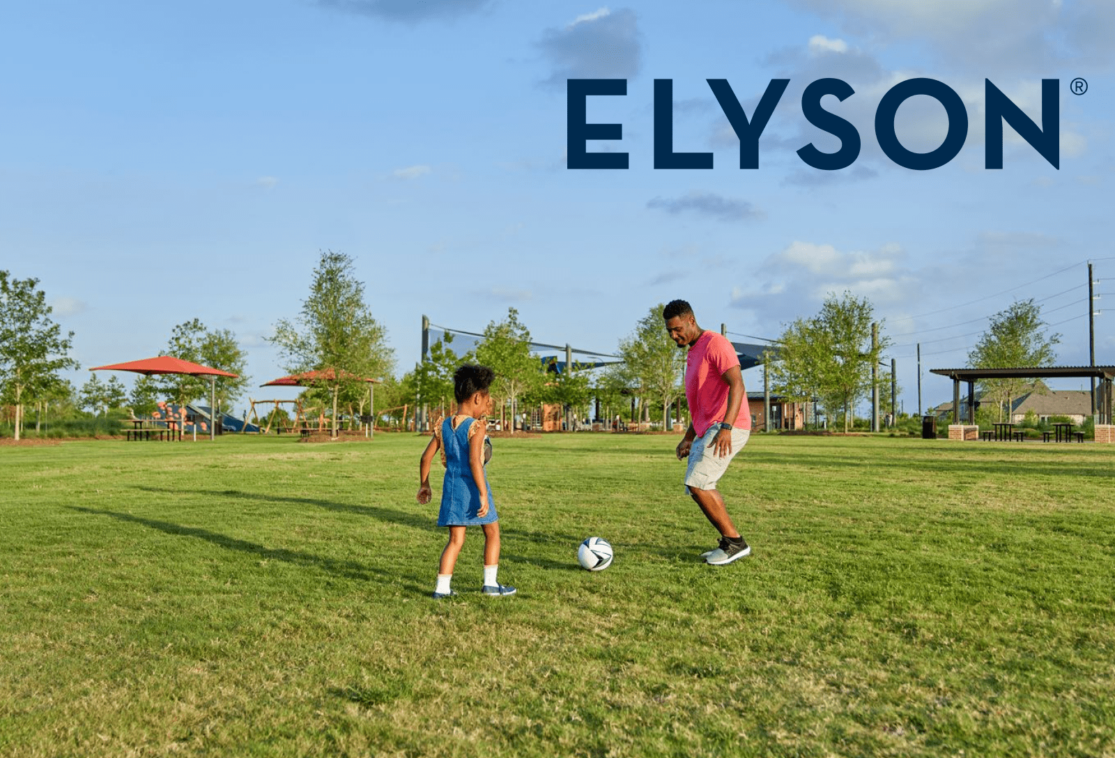 Playing Soccer With Elyson Logo in Background